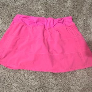 Neon pink pace rival lululemon skort with a 15” inseam. Size 10!